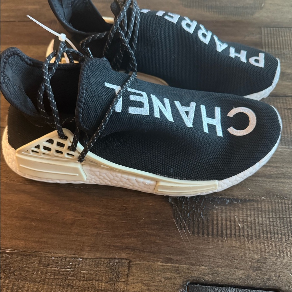 CHANEL Black and White Pharrell Sneakers - Picture 2 of 5